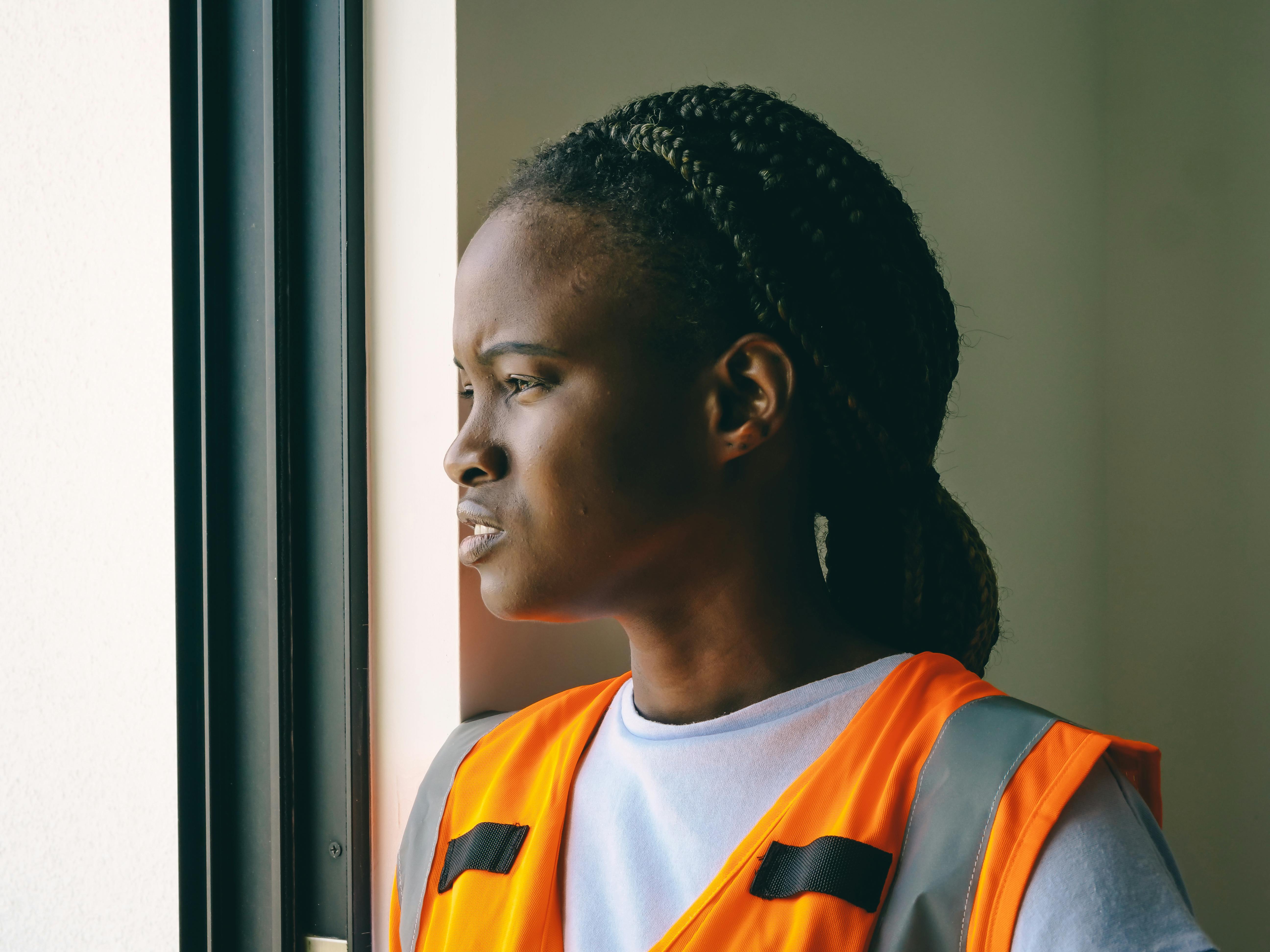 African woman feeling safe and hopeful - UOMU support